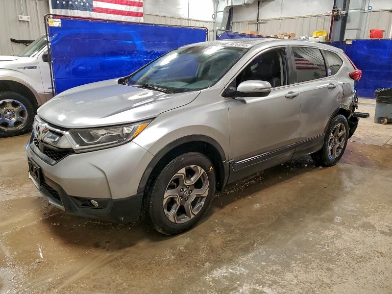 HONDA CR-V 2017 with VIN 2HKRW2H80HH661859 - Photo from auction