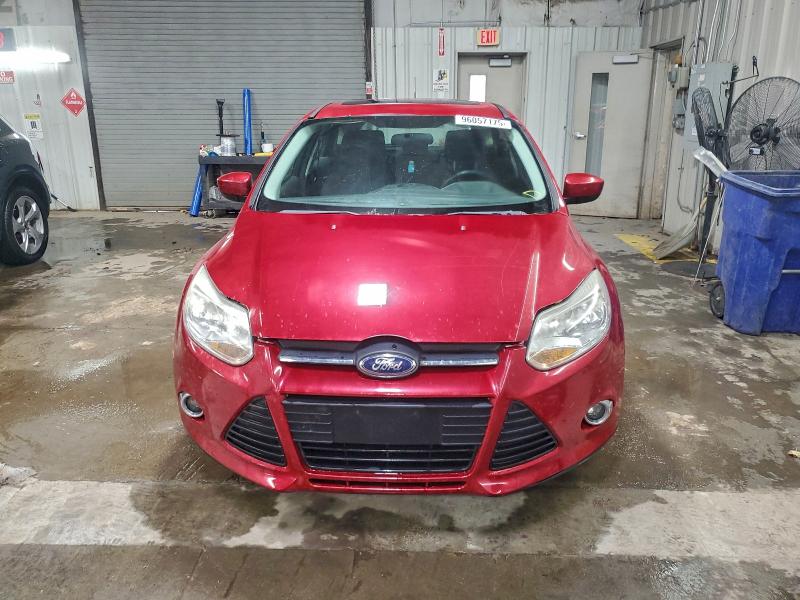 Foto 5 de la subasta – 2012 FORD FOCUS SE con VIN 1FAHP3K20CL414175