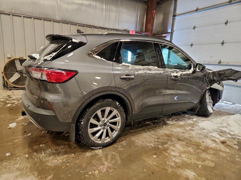Photo 3 from auction – 2021 FORD ESCAPE TIT with VIN 1FMCU9DZ1MUA43626