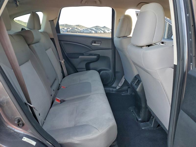 Photo 11 from auction – 2015 HONDA CR-V LX with VIN 2HKRM4H30FH636639