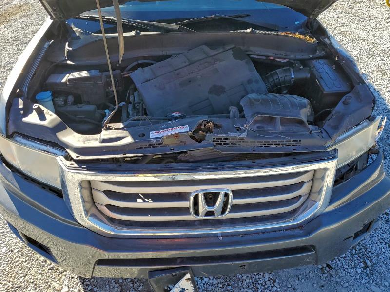 Photo 11 from auction – 2013 HONDA RIDGELINE with VIN 5FPYK1F41DB005400