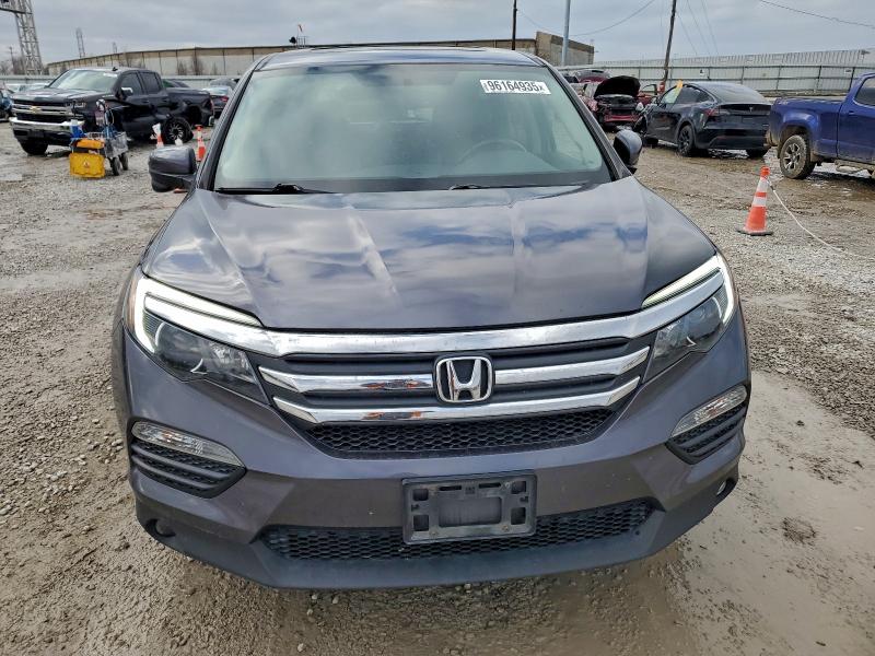 Photo 5 from auction – 2018 HONDA PILOT EXL with VIN 5FNYF6H5XJB044661