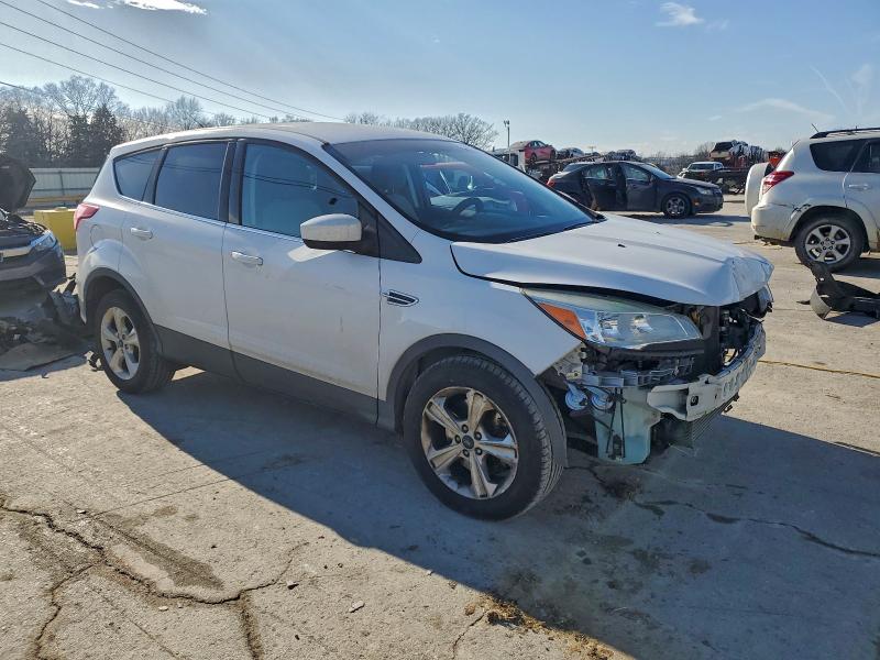 Photo 4 from auction – 2014 FORD ESCAPE SE with VIN 1FMCU9G97EUA31235