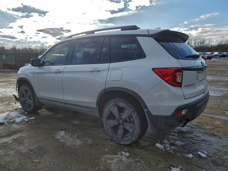 Photo 2 from auction – 2021 HONDA PASSPORT E with VIN 5FNYF8H04MB020389