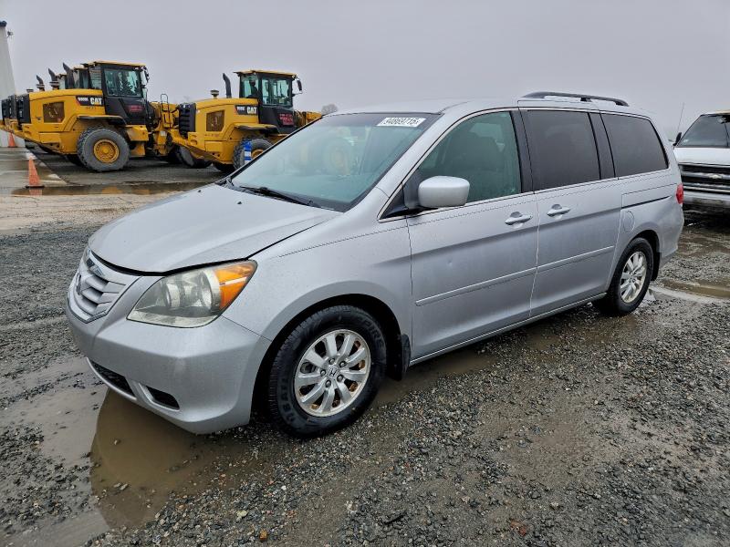 HONDA ODYSSEY EX 2010 with VIN 5FNRL3H46AB009599 - Photo from auction
