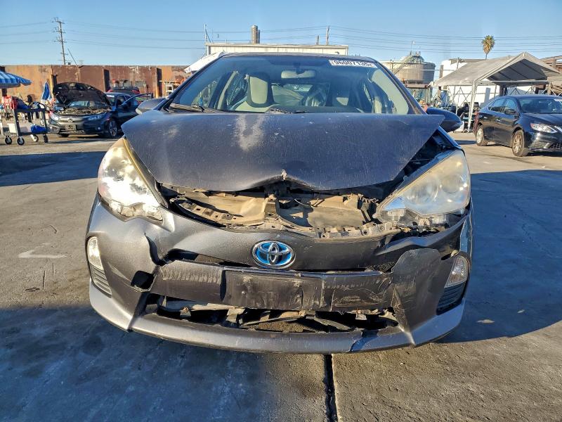 Photo 5 from auction – 2014 TOYOTA PRIUS C with VIN JTDKDTB36E1082470