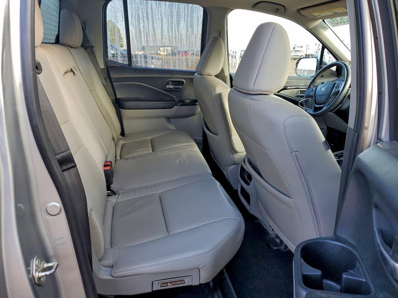 Photo 10 from auction – 2017 HONDA RIDGELINE with VIN 5FPYK3F77HB024674