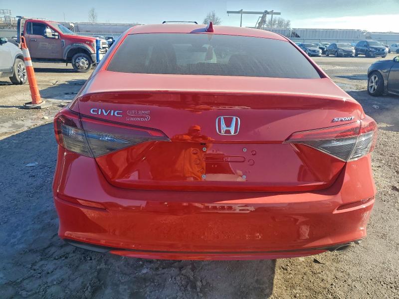 Photo 6 from auction – 2022 HONDA CIVIC SPOR with VIN 2HGFE2F5XNH564379