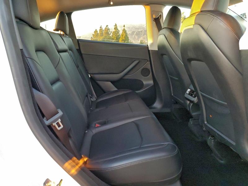 Photo 11 from auction – 2023 TESLA MODEL Y with VIN 7SAYGDEE0PF886023
