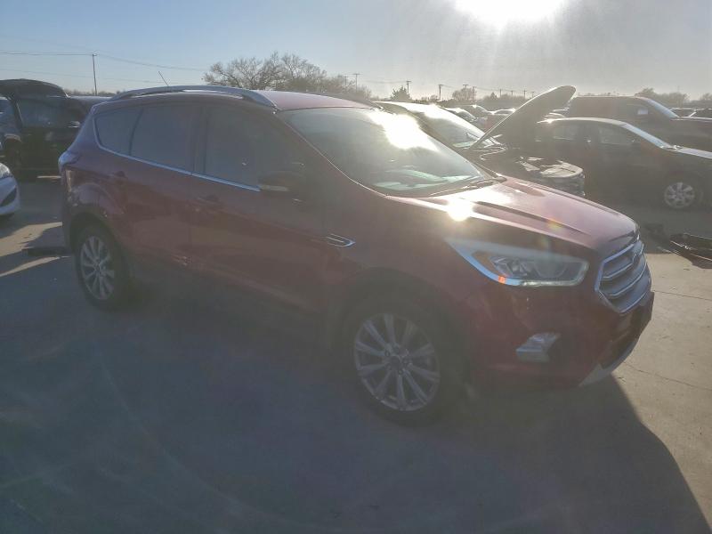 Photo 4 from auction – 2017 FORD ESCAPE TIT with VIN 1FMCU0J94HUD84301