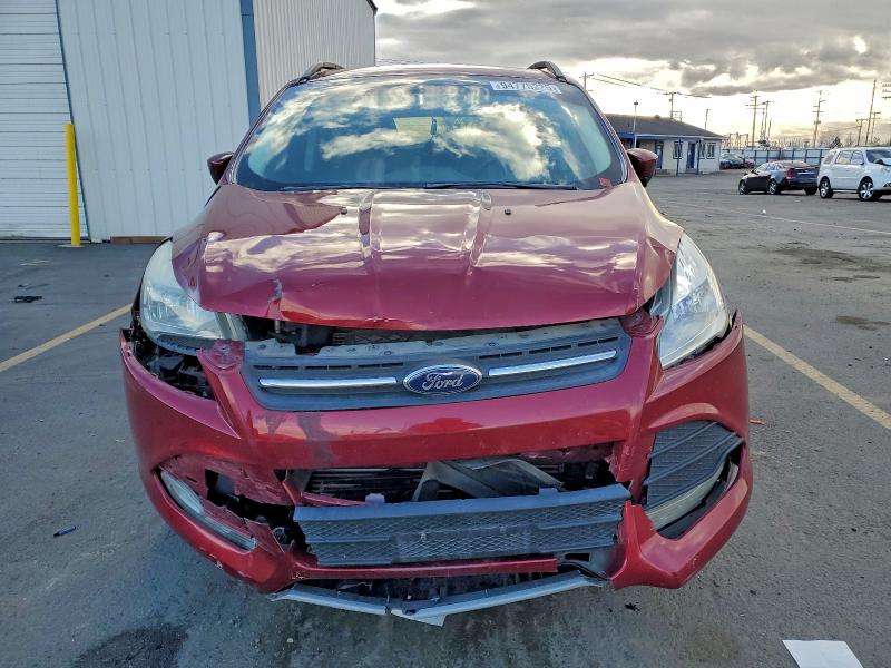 Photo 5 from auction – 2016 FORD ESCAPE SE with VIN 1FMCU9GX2GUA98410
