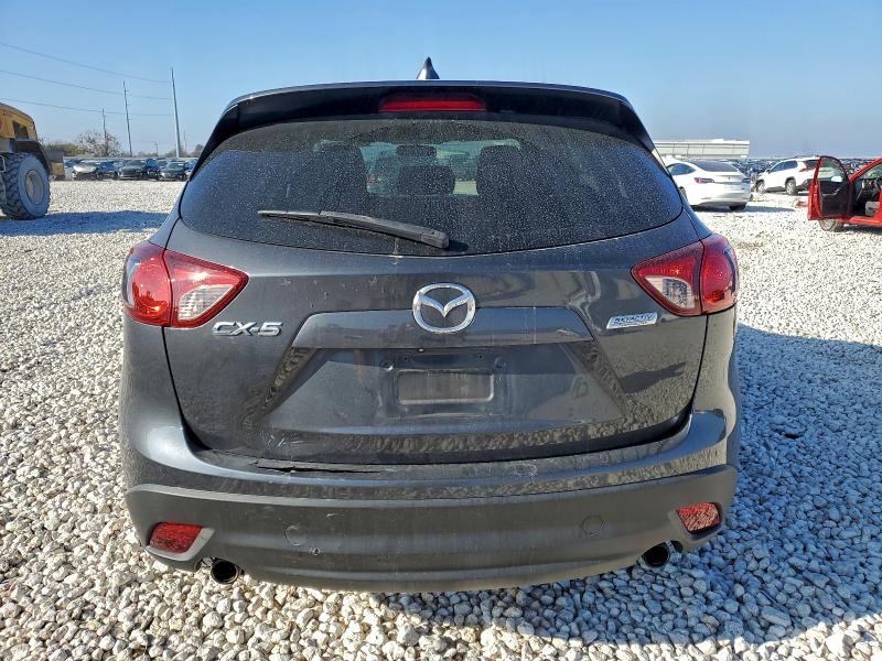 Photo 6 from auction – 2014 MAZDA CX-5 TOURI with VIN JM3KE2CY0E0389843