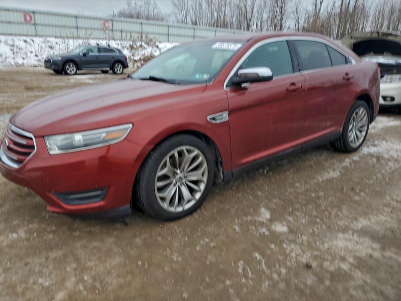FORD TAURUS 2014 with VIN 1FAHP2F81EG163672 - Photo from auction
