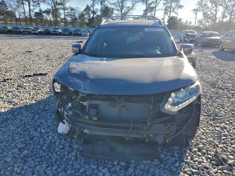 Photo 5 from auction – 2015 NISSAN ROGUE S with VIN 5N1AT2MT0FC838351