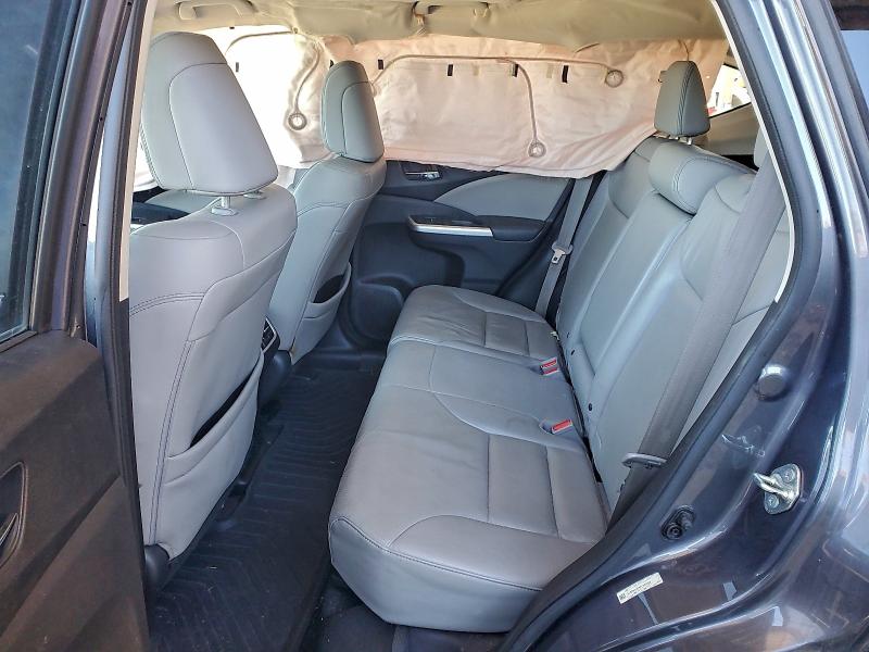 Photo 10 from auction – 2015 HONDA CR-V EXL with VIN 5J6RM4H79FL069128