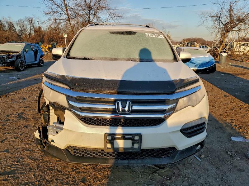 Photo 5 from auction – 2016 HONDA PILOT EXL with VIN 5FNYF6H87GB035919