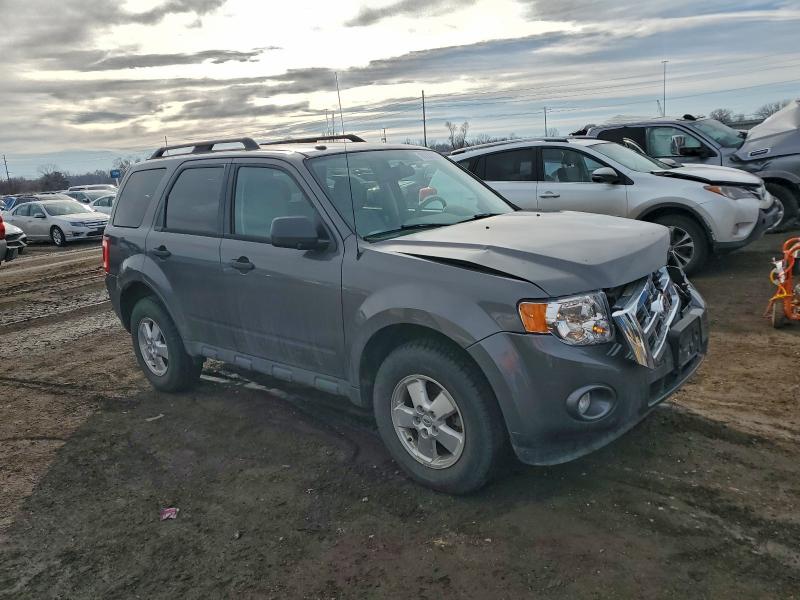 Photo 4 from auction – 2011 FORD ESCAPE XLT with VIN 1FMCU0D76BKB03127