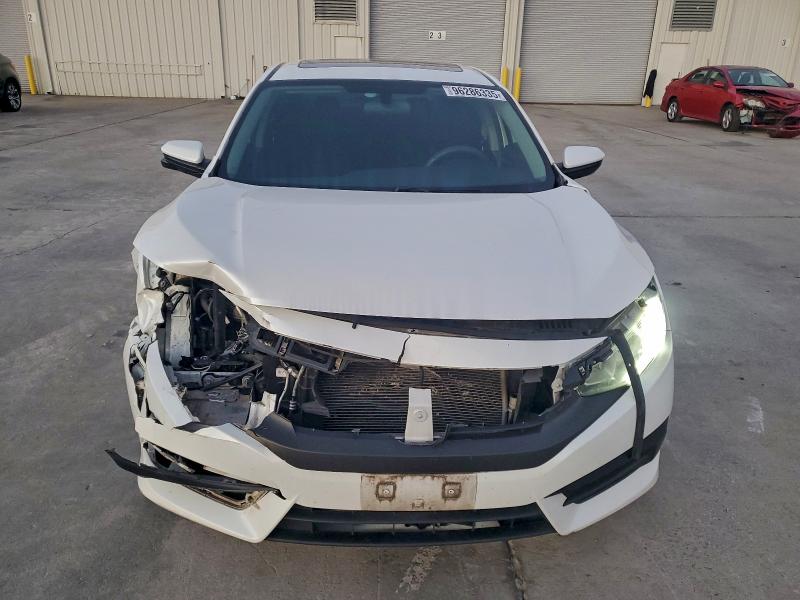 Photo 5 from auction – 2017 HONDA CIVIC EX with VIN 19XFC2F77HE009556