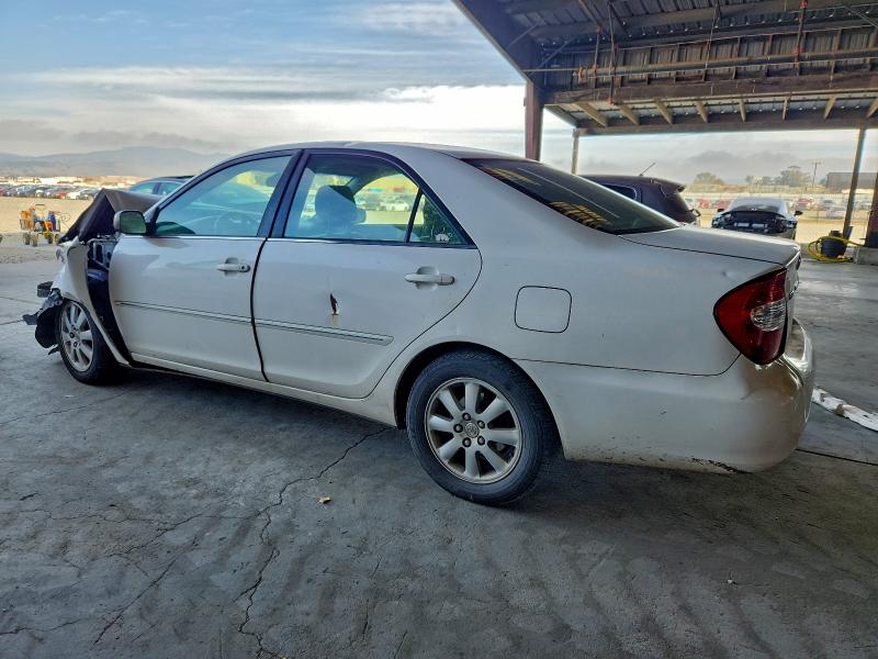 Photo 2 from auction – 2003 TOYOTA CAMRY LE with VIN JTDBE32K230144714