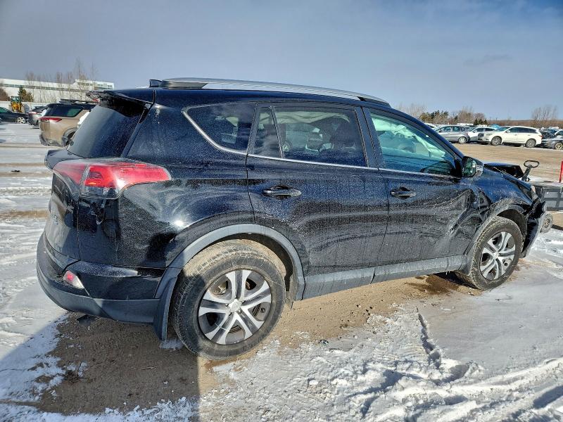 Photo 3 from auction – 2016 TOYOTA RAV4 LE with VIN 2T3BFREV0GW523833