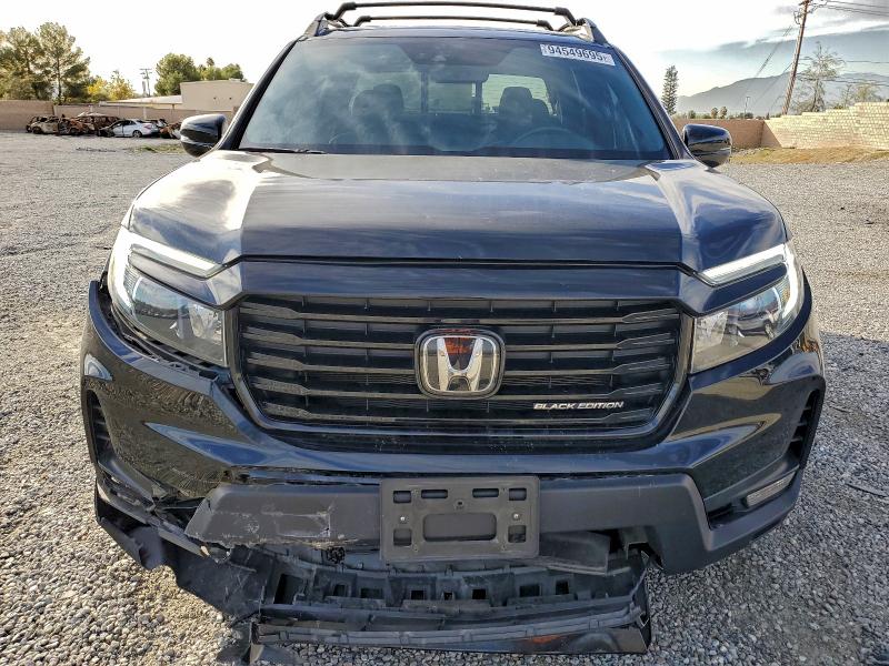 Photo 5 from auction – 2023 HONDA RIDGELINE with VIN 5FPYK3F83PB058649