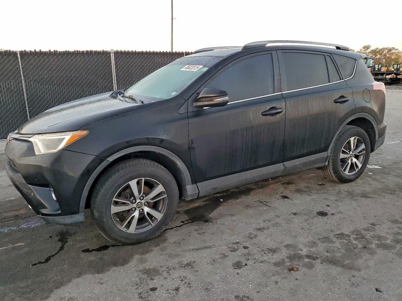 TOYOTA RAV4 XLE 2016 with VIN 2T3WFREV1GW237135 - Photo from auction