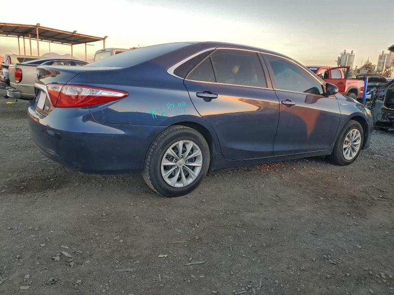 Photo 3 from auction – 2016 TOYOTA CAMRY HYBR with VIN 4T1BD1FK8GU184064