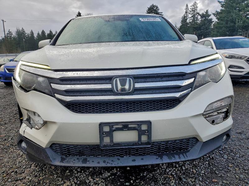 Photo 5 from auction – 2018 HONDA PILOT EXL with VIN 5FNYF6H68JB033134
