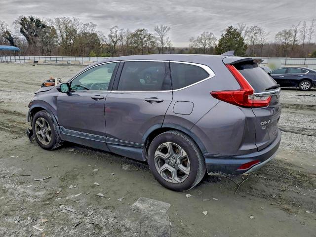 Photo 2 from auction – 2017 HONDA CR-V EXL with VIN 7FARW1H85HE014810