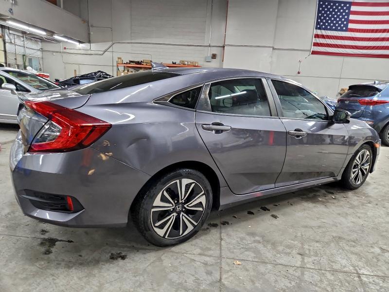 Photo 3 from auction – 2016 HONDA CIVIC with VIN 19XFC1F35GE028631