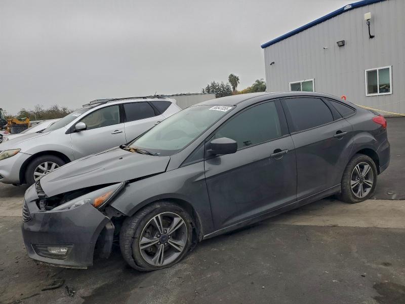 FORD FOCUS SE 2018 with VIN 1FADP3FEXJL223900 - Photo from auction
