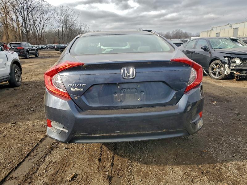 Photo 6 from auction – 2017 HONDA CIVIC LX with VIN 19XFC2F56HE205938