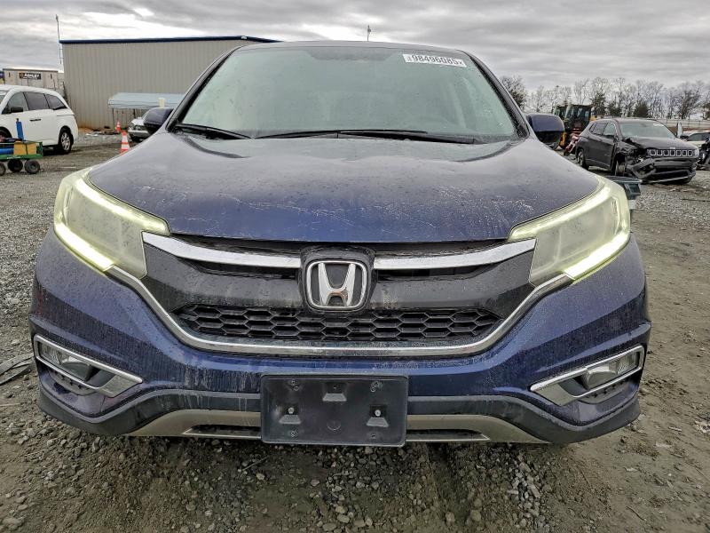 Photo 5 from auction – 2015 HONDA CR-V EX with VIN 2HKRM3H50FH534348
