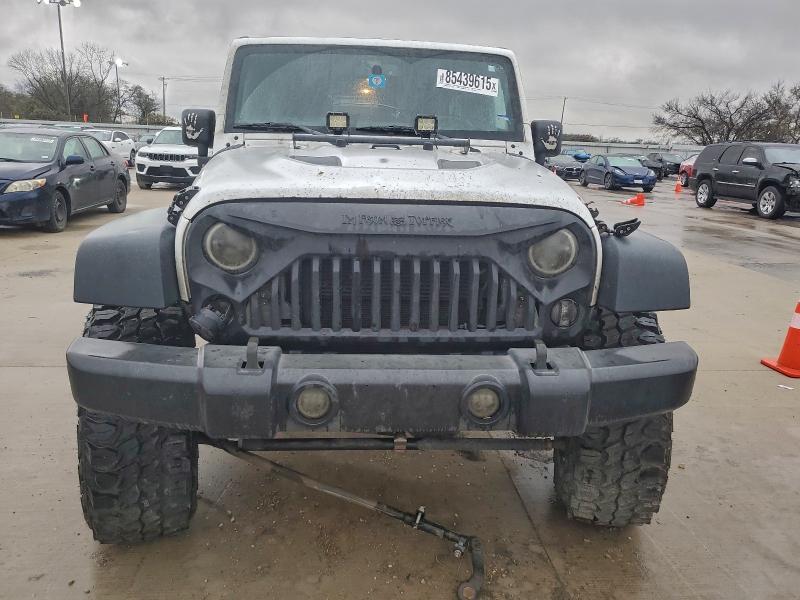 Photo 5 from auction – 2015 JEEP WRANGLER U with VIN 1C4BJWDG3FL767381