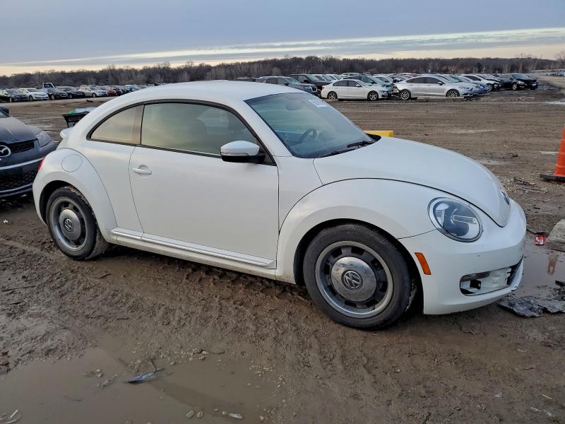 Photo 4 from auction – 2014 VOLKSWAGEN BEETLE with VIN 3VWJ17AT7EM659875
