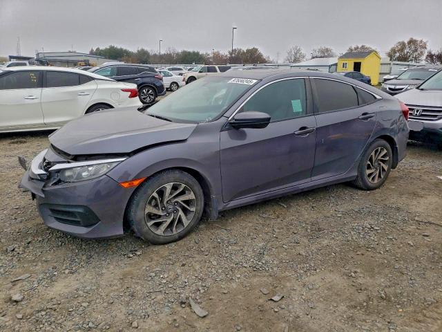 HONDA CIVIC EX 2018 with VIN 2HGFC2F70JH594430 - Photo from auction