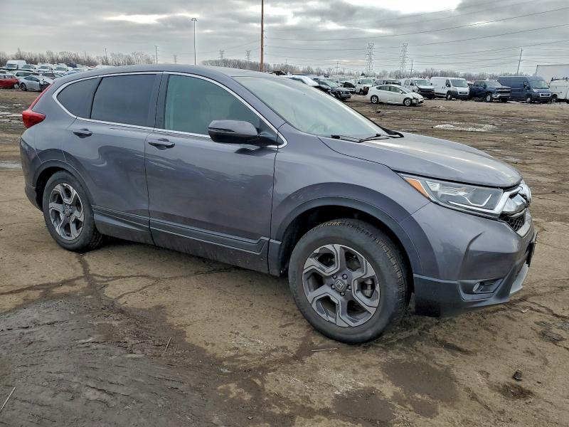 Photo 4 from auction – 2018 HONDA CR-V EX with VIN 7FARW2H57JE101013