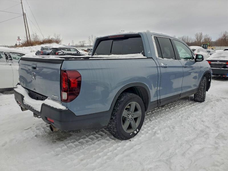 Photo 3 from auction – 2023 HONDA RIDGELINE with VIN 5FPYK3F51PB030189