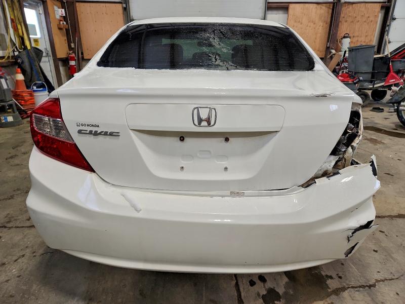 Photo 6 from auction – 2012 HONDA CIVIC LX with VIN 2HGFB2F52CH019539