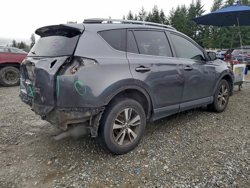 Photo 3 from auction – 2017 TOYOTA RAV4 XLE with VIN JTMRFREVXHD198573