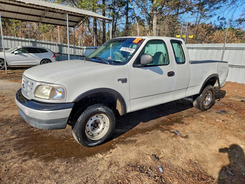 FORD F150 1999 with VIN 1FTRX18W0XNA26256 - Photo from auction