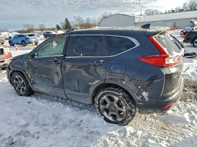 Photo 2 from auction – 2018 HONDA CR-V EX with VIN 7FARW2H59JE084585
