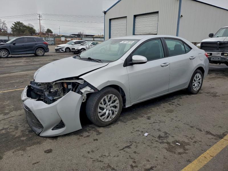 TOYOTA COROLLA L 2018 with VIN 5YFBURHE6JP751189 - Photo from auction