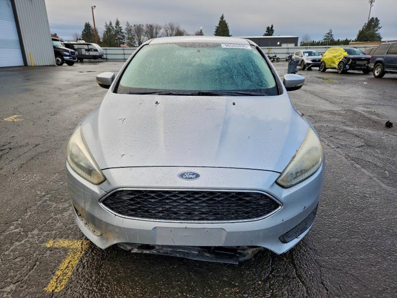 Photo 5 from auction – 2016 FORD FOCUS SE with VIN 1FADP3K29GL283204