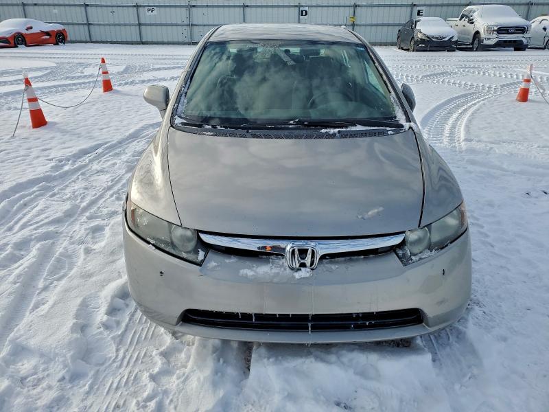 Photo 5 from auction – 2006 HONDA CIVIC LX with VIN 1HGFA16536L123056