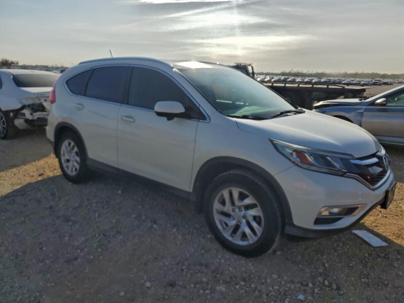 Photo 4 from auction – 2015 HONDA CR-V EXL with VIN 5J6RM3H70FL002606