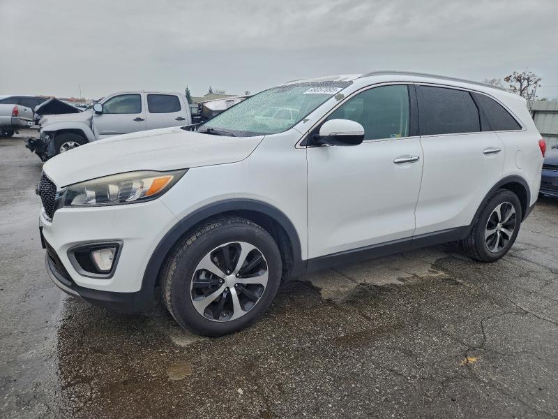 KIA SORENTO EX 2016 with VIN 5XYPH4A15GG028046 - Photo from auction