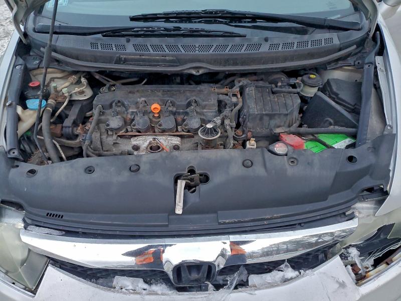 Photo 11 from auction – 2011 HONDA CIVIC LX with VIN 2HGFA1F57BH301087