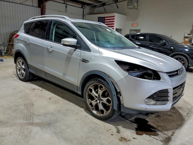 Photo 4 from auction – 2014 FORD ESCAPE TIT with VIN 1FMCU9JX9EUA49792