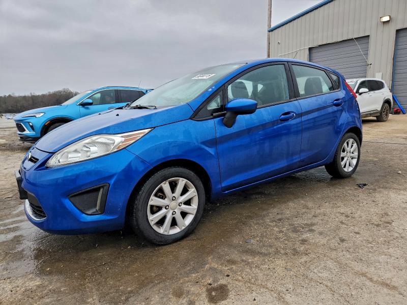 FORD FIESTA SE 2011 with VIN 3FADP4EJ0BM140433 - Photo from auction